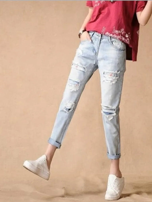 High distressed cutout patch work jeans Periwinkley Shop