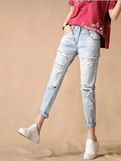 High distressed cutout patch work jeans Periwinkley Shop